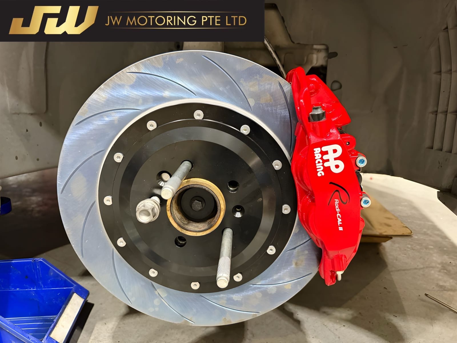 AP Racing big brake kit upgrade proof at JW Motoring — caliper and rotor fitment checked for wheel clearance