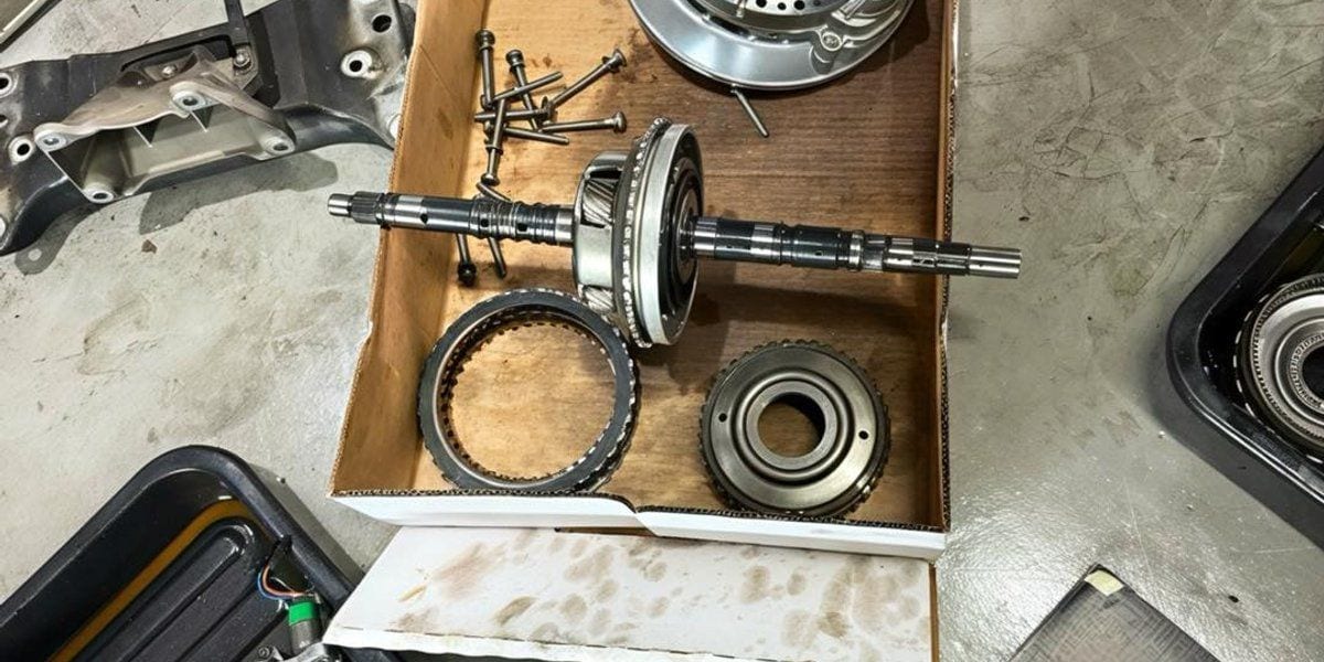 Transmission assembly area at JW Motoring — gearbox inspection and rebuild culture, Singapore